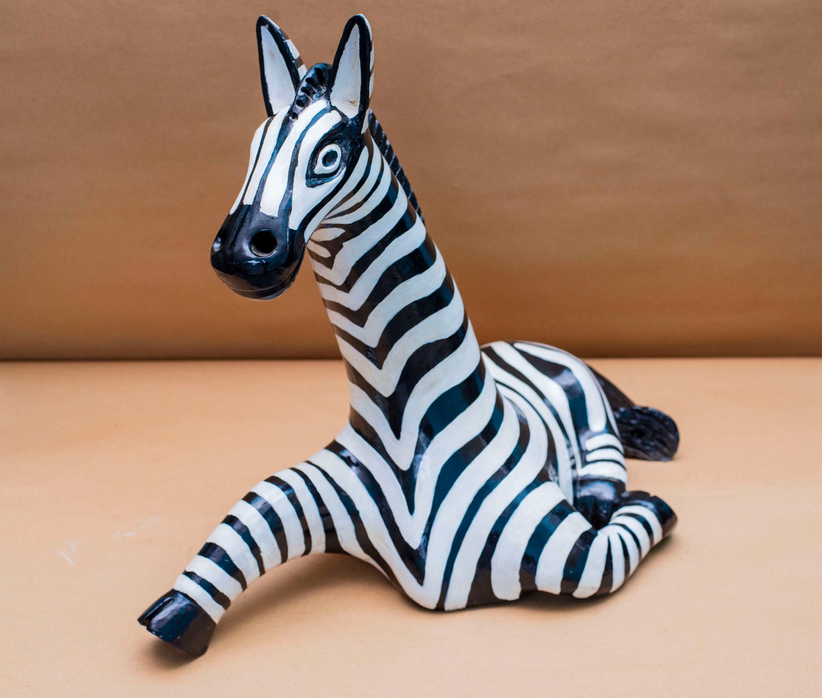 Majestic Zebra Reclining Ceramic Sculpture