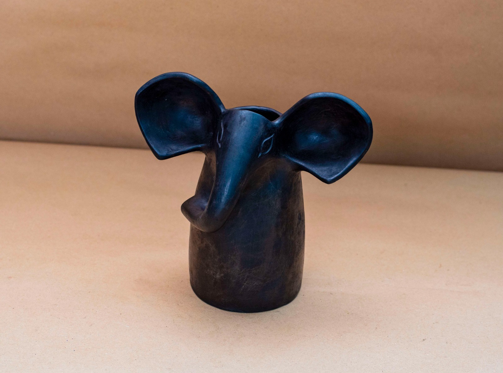 Shadowed Canopy Elephant Head Flower Vase