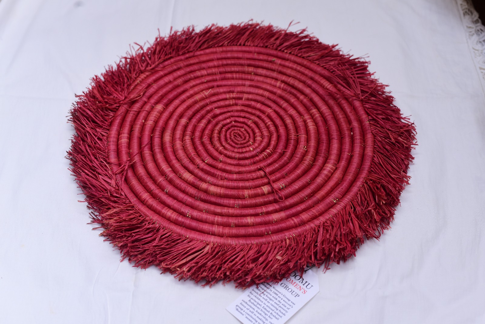 The Crimson Fringe Raffia Placemat & Wall Hanging
